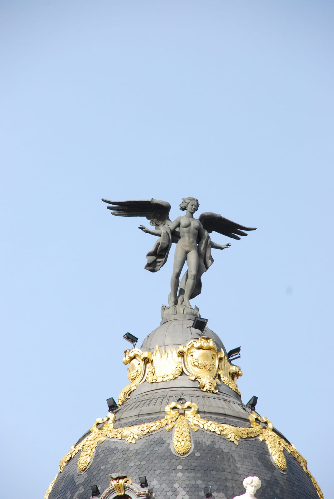 sculpture statue landmark Metropolis Building in Madrid