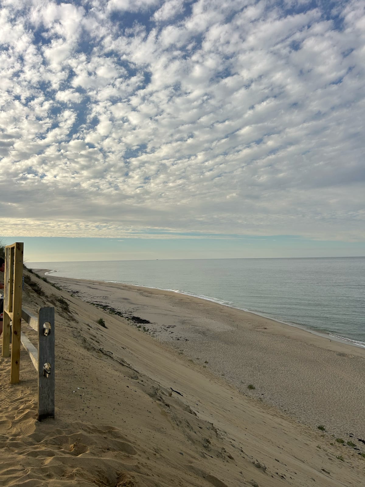 cape cod bay beach dramatic clouds in Massachusetts