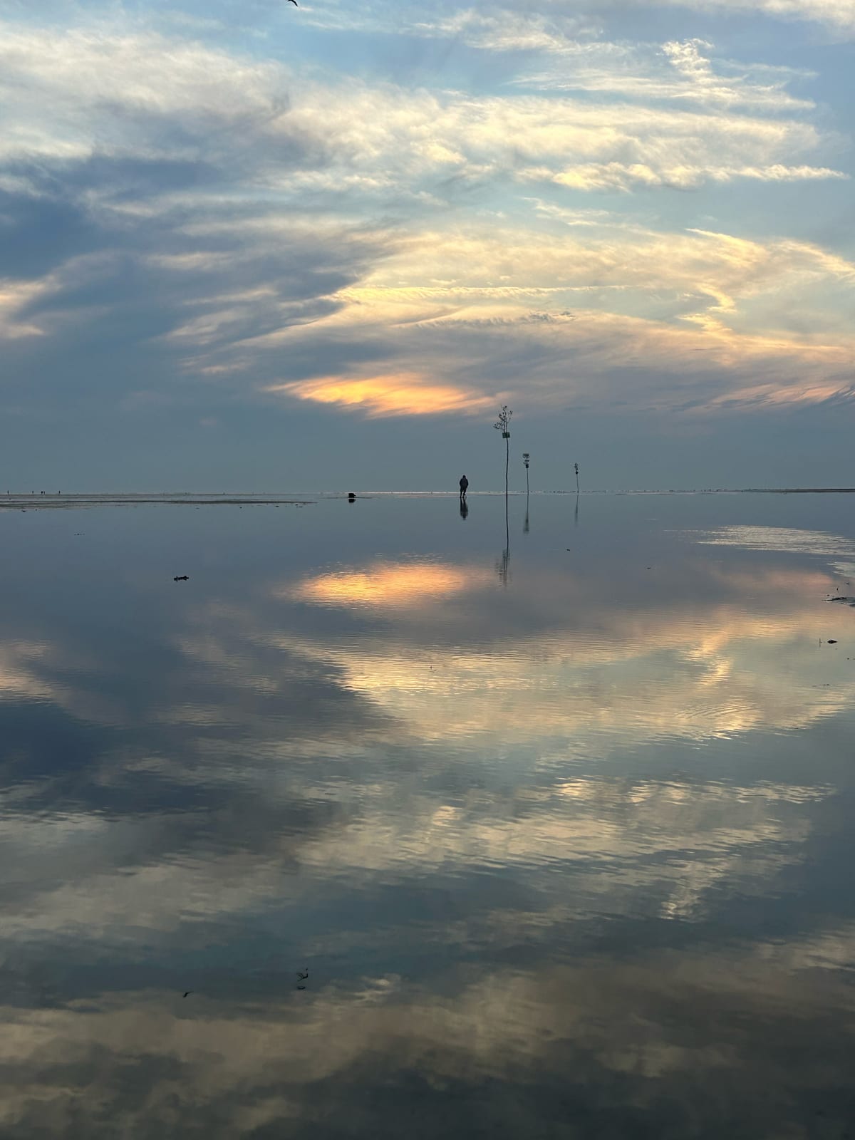 cape cod bay sailboat dramatic clouds in Massachusetts