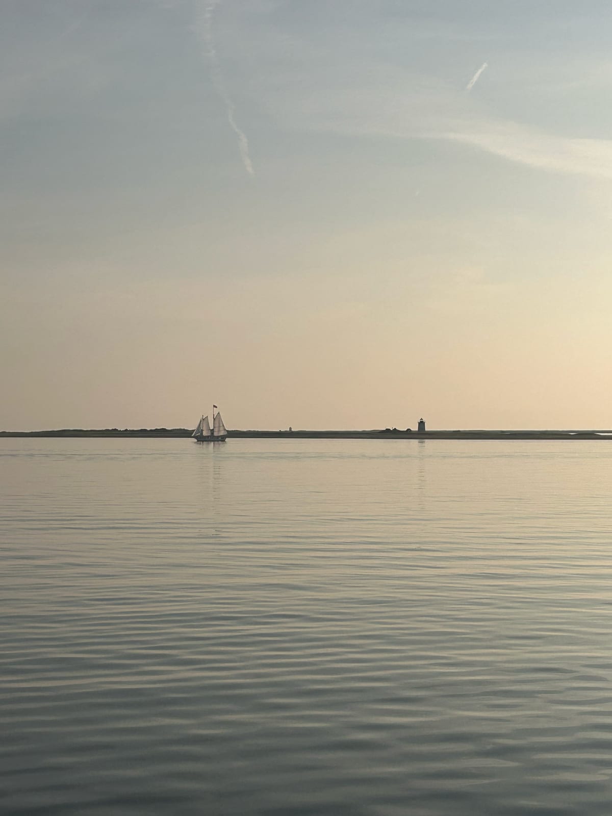 cape cod bay sailboat misty morning in Massachusetts