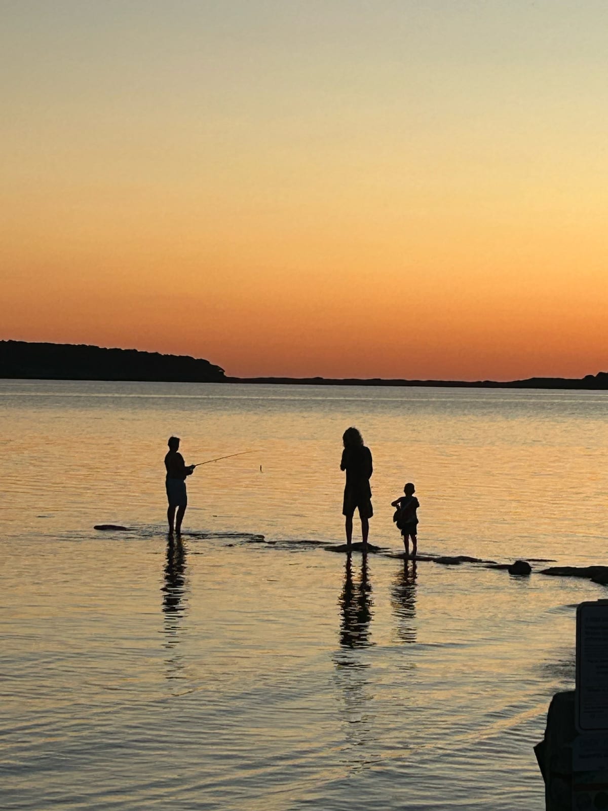 cape cod bay sunset kayakers golden water in Massachusetts