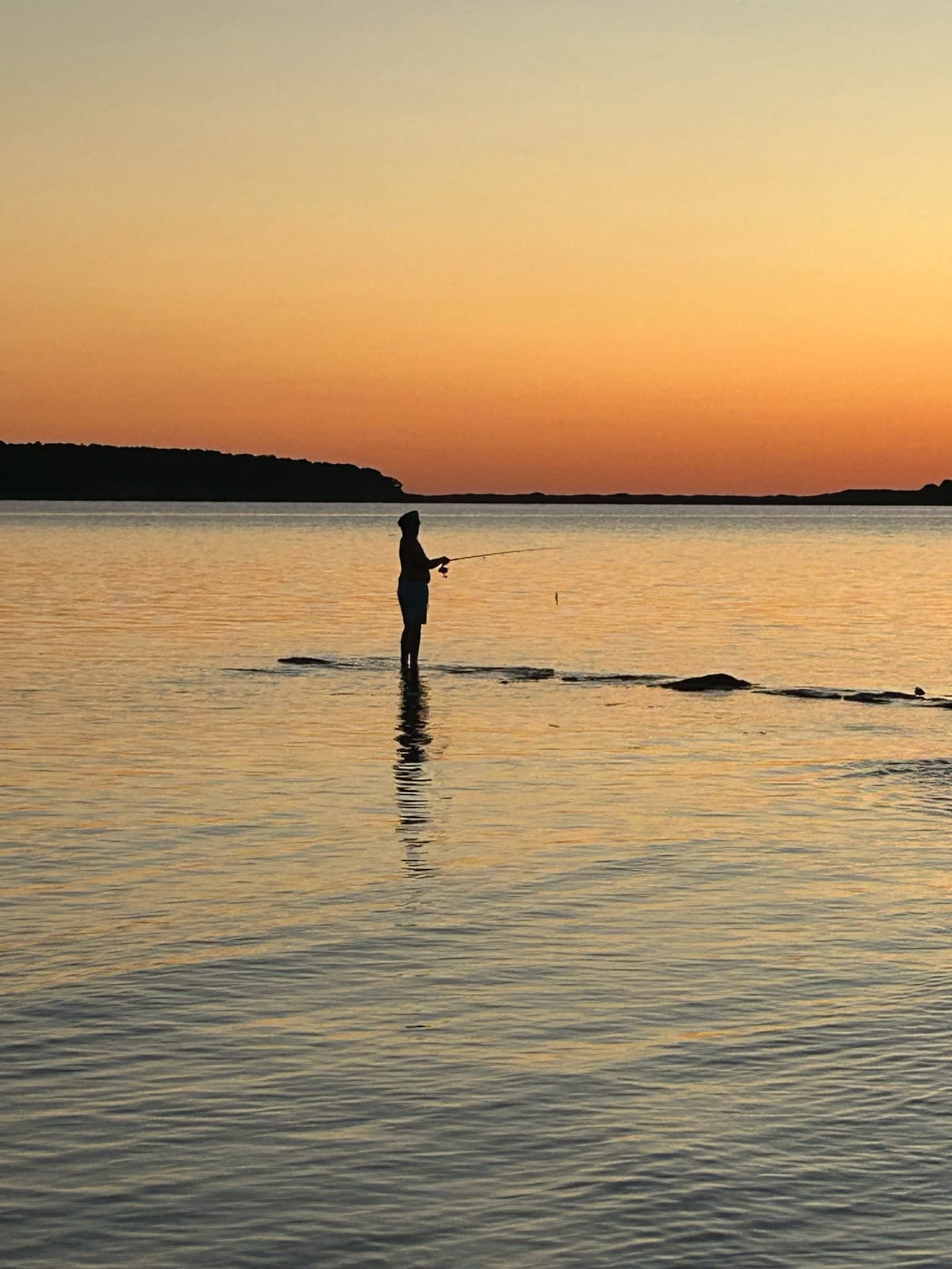 cape cod bay sunset paddleboard reflection in Massachusetts