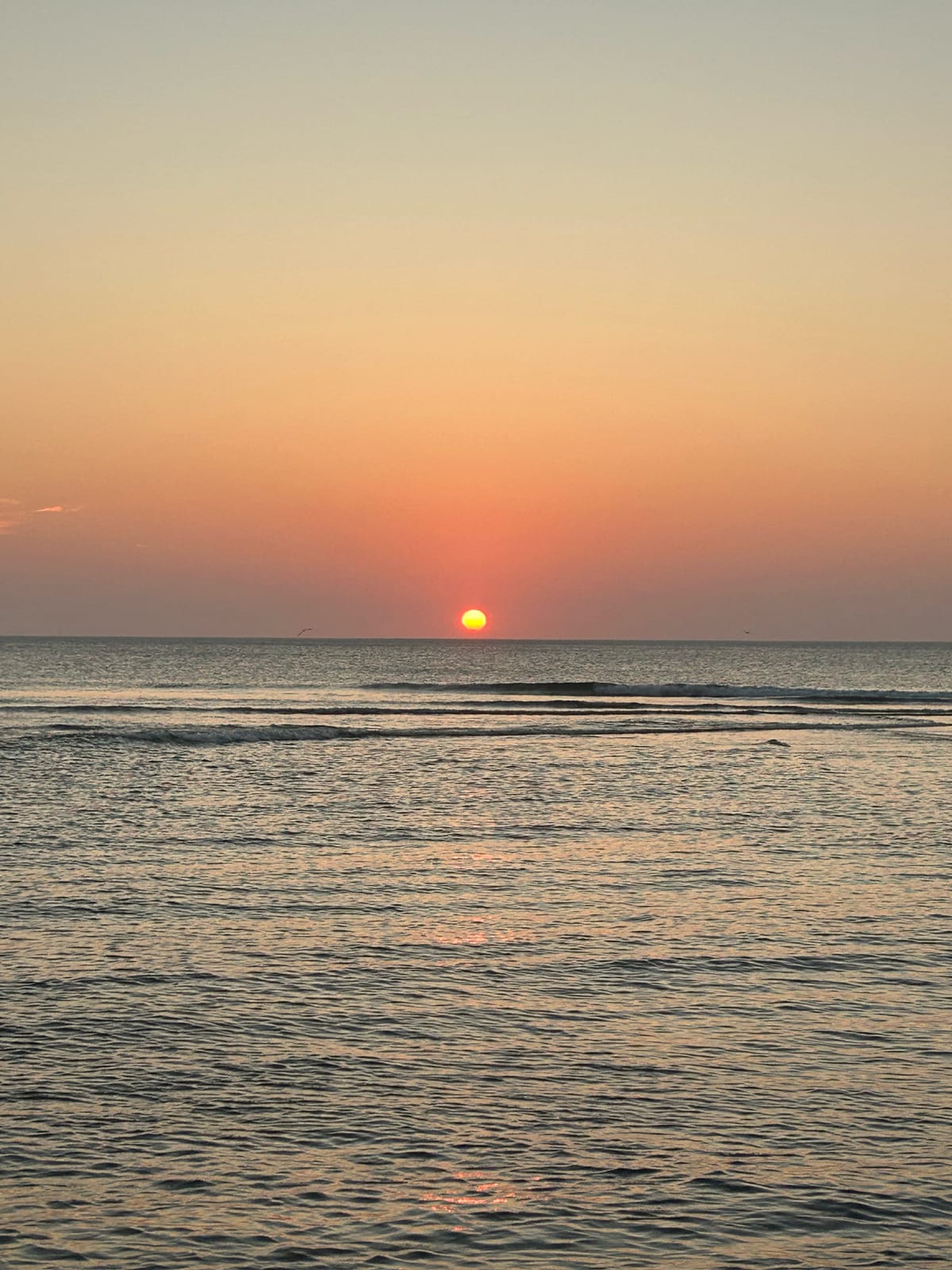 cape cod bay sunset sun reflection water in Massachusetts