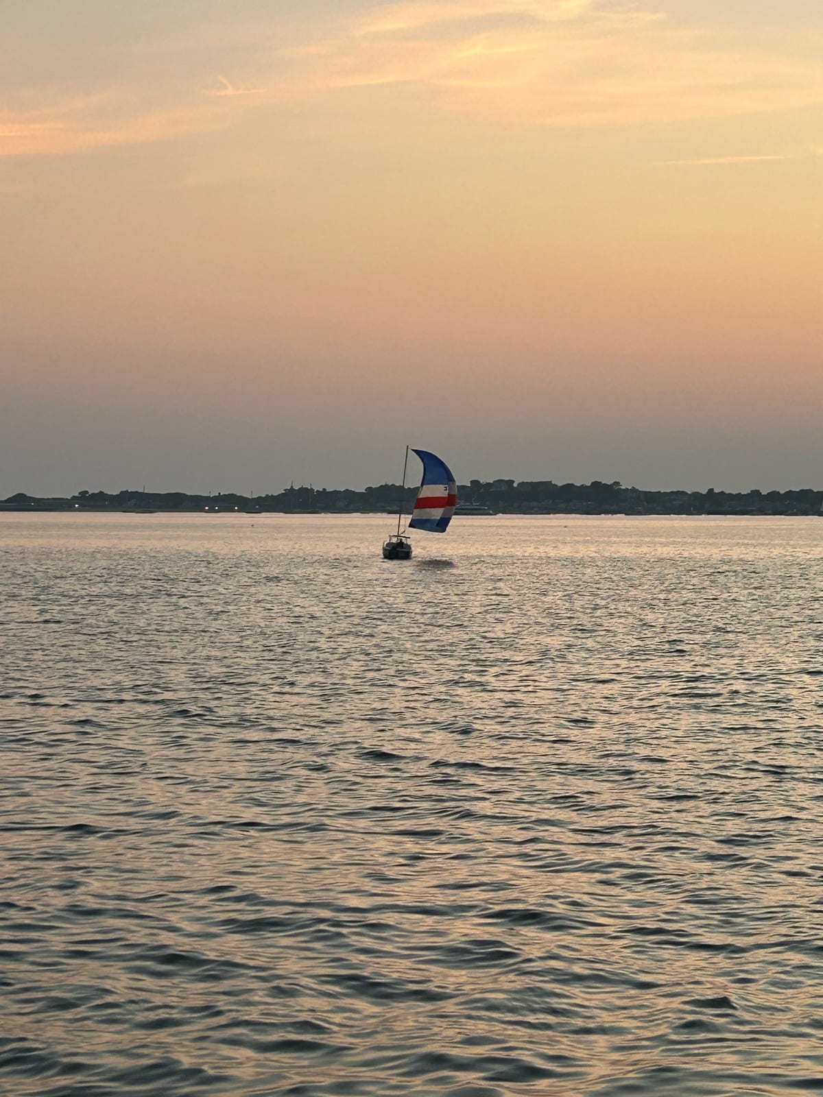 cape cod bay windsurfer sunset golden in Massachusetts