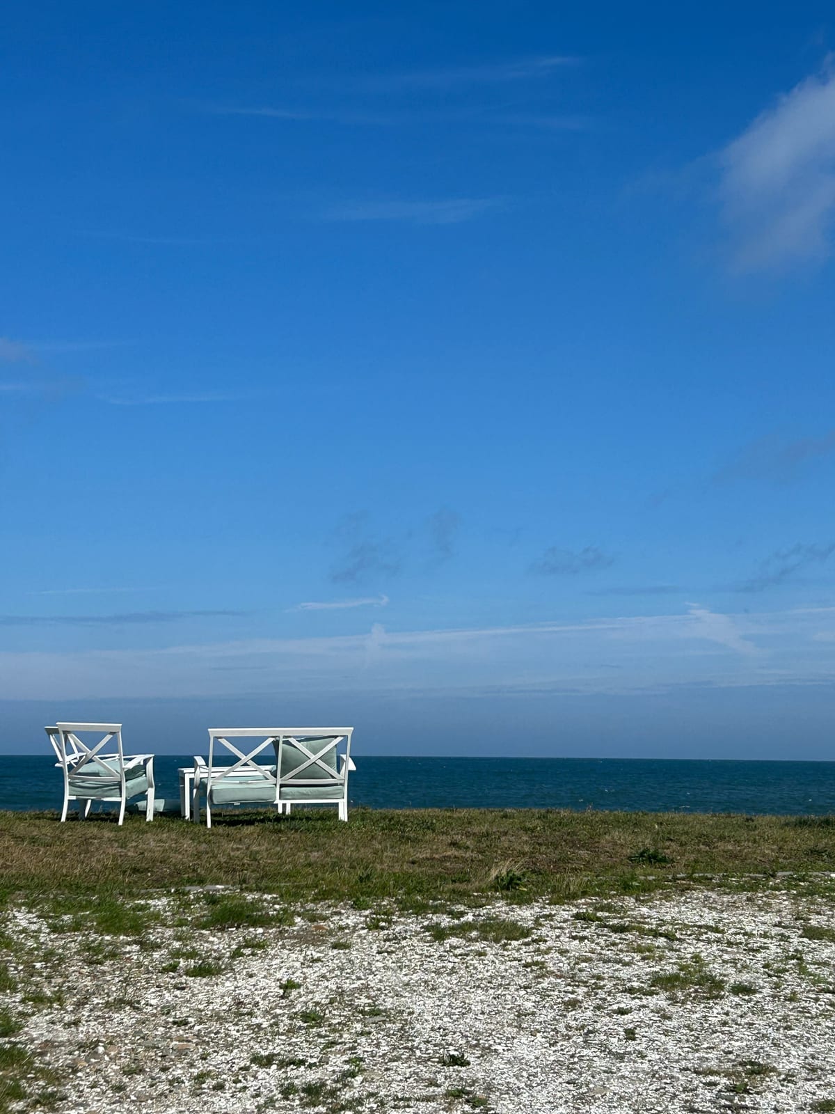 cape cod beach lifeguard chairs blue sky in Massachusetts