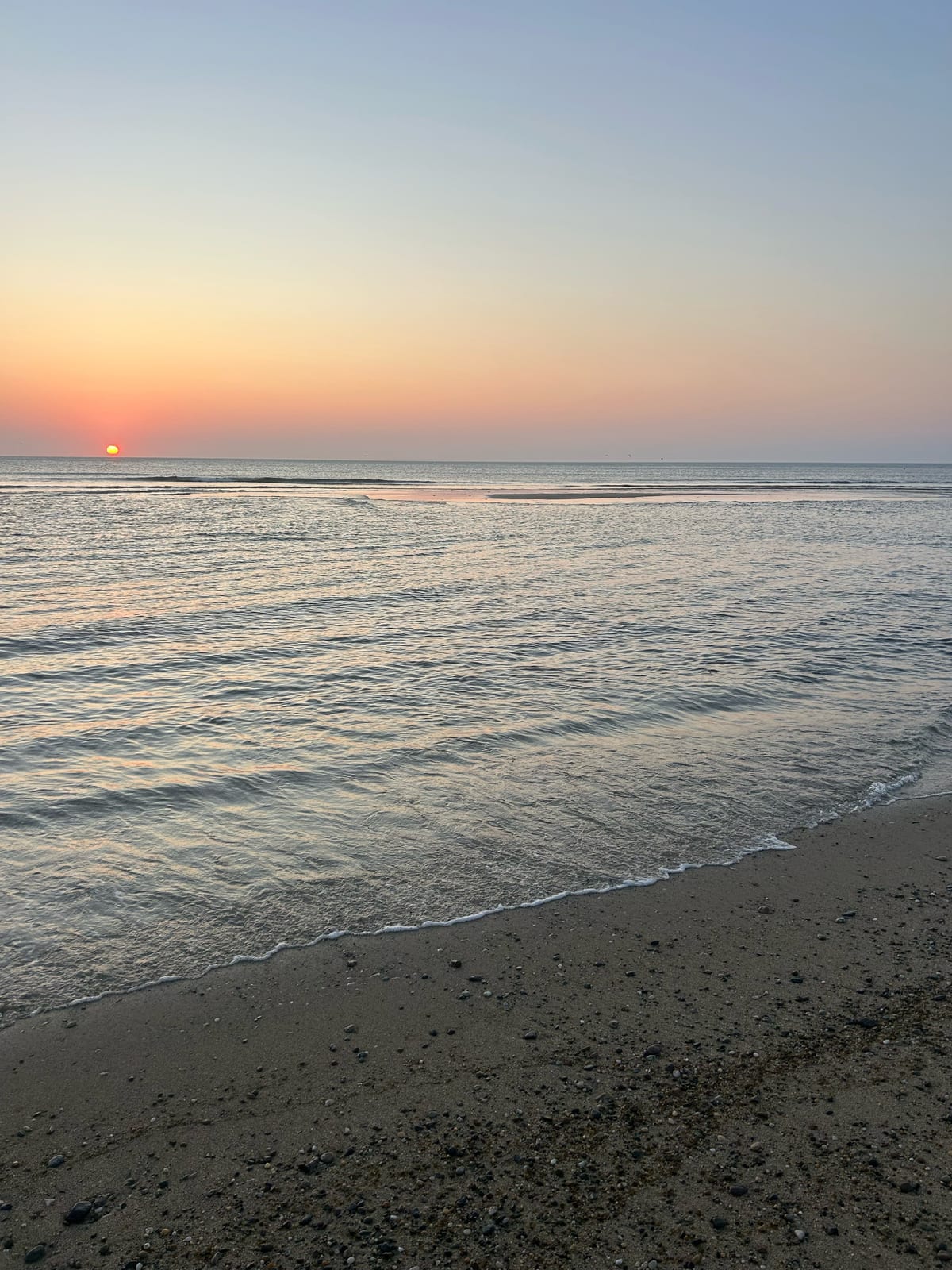 cape cod beach sunset waves golden light in Massachusetts