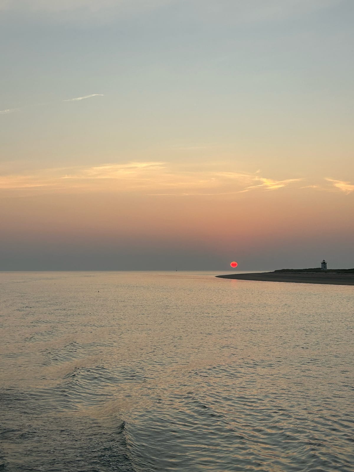 cape cod lighthouse sunset silhouette in Massachusetts