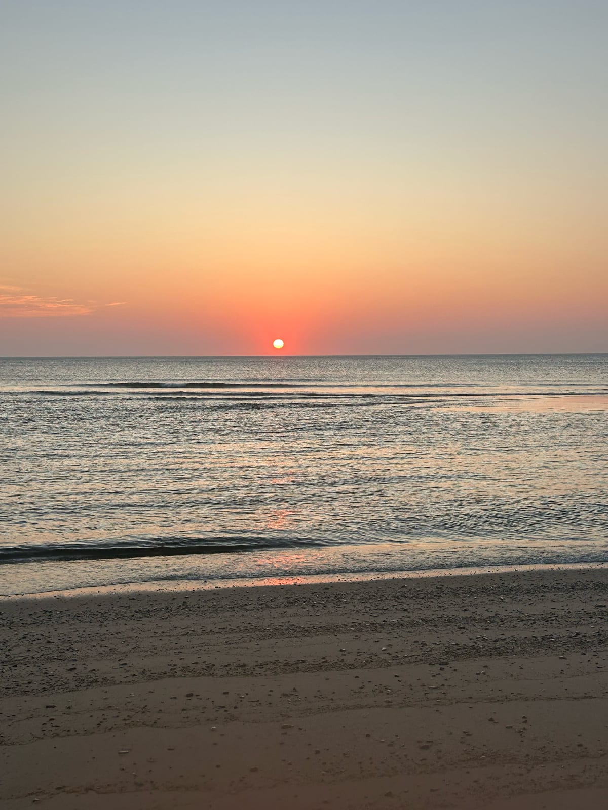 cape cod sunset waves golden sand in Massachusetts
